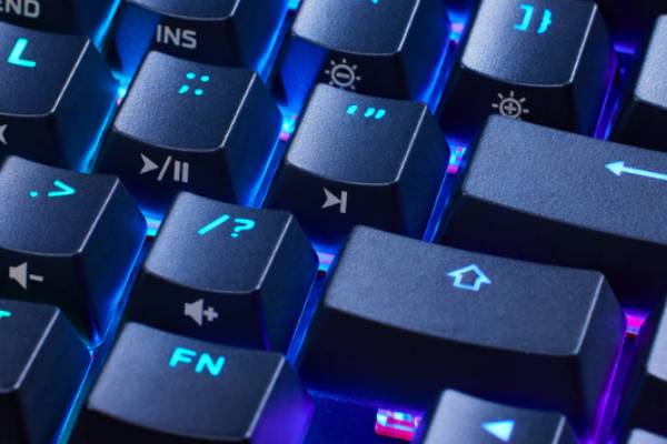 Double shot PBT keycaps with side-printed secondary functions